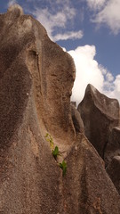 Granite rocks against cloudy sky