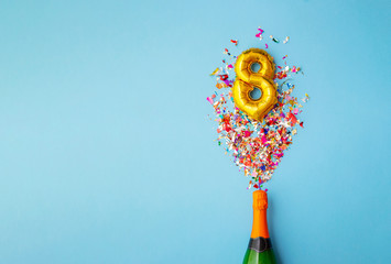 8th anniversary champagne bottle balloon pop - obrazy, fototapety, plakaty