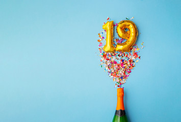 19th anniversary champagne bottle balloon pop