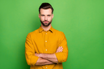 Fototapeta premium Photo of amazing young business man bossy crossed arms watching colleagues working strict chief formalwear yellow shirt isolated bright green color background