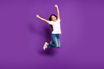Full length body size view of her she nice attractive cheerful wavy-haired girl jumping having fun...