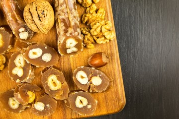 Churchkhela or Churchkela, the traditional Georgian homemade sweets with nuts. Sweet food. Traditional folk food.