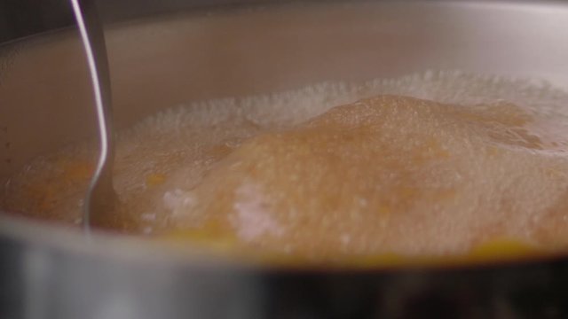 Soup boiling and stiring - slow motion