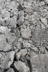 Broken concrete  surface in construction site made by excavator