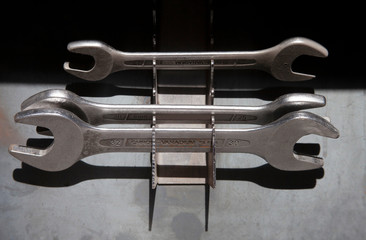 Wrench tool set on steel plate