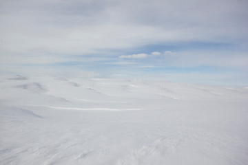 Fototapeta na wymiar Snow covered mountains. Beautiful winter landscape.
