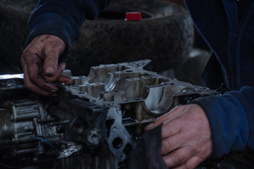 car engine repair by a specialist in service