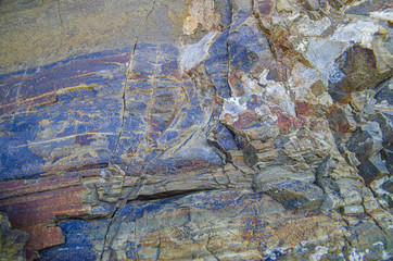Color rock close up. Natural forms in stone structure. Background, texture. - 322964463