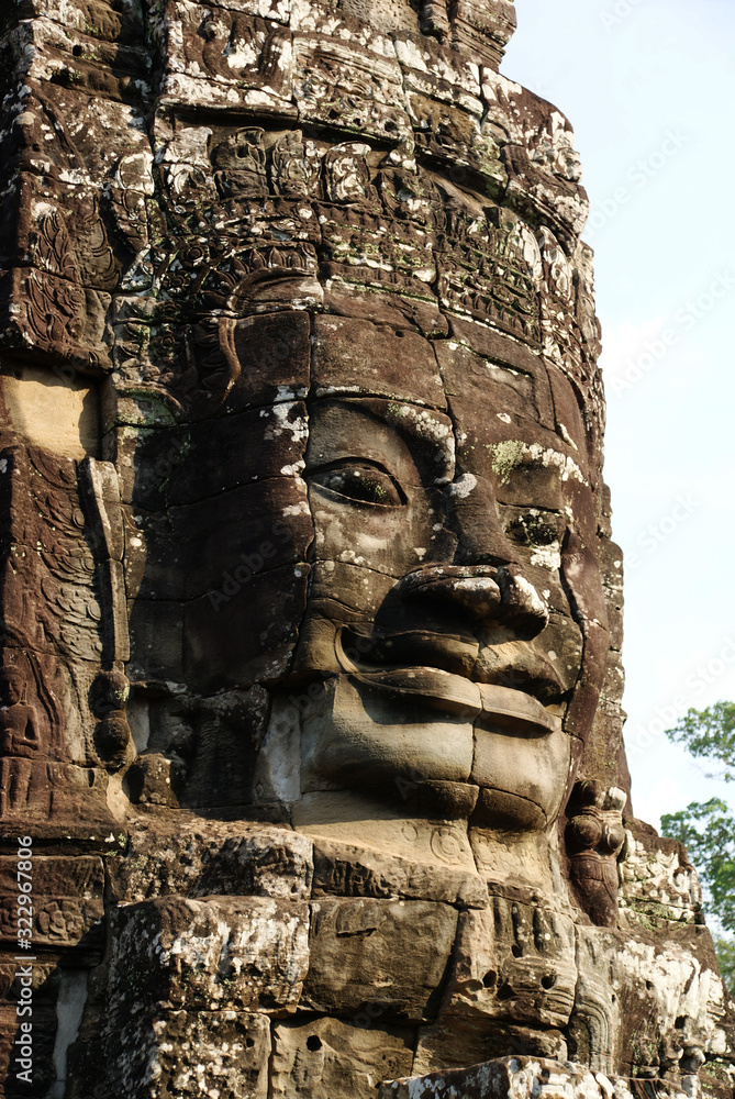 Wall mural stone statues of the ancient temple complex of angkor watt in cambodia