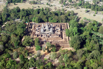 Fototapeta na wymiar Angkor Watt temples lost in the jungle aerial view