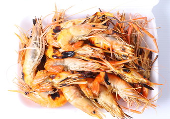 Grilled shrimps on white background