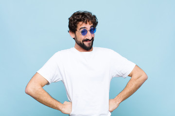 young crazy bearded man wearing sunglasses