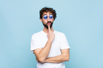 young crazy bearded man wearing sunglasses