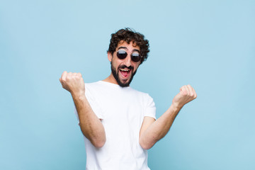 young crazy bearded man wearing sunglasses