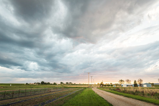 Evening clouds roll over the Montana plains with great sunset colors. Laurel, Montana, USA