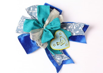 Blue bow made of ribbon isolated on white