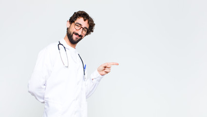 young crazy bearded doctor man against copy space wall