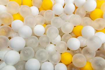 lots of colored balls in a playground ball pool