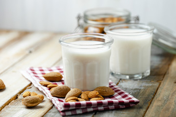 Fresh organic vegan almond milk. Alternative source of protein for vegetarians. Raw almonds as...