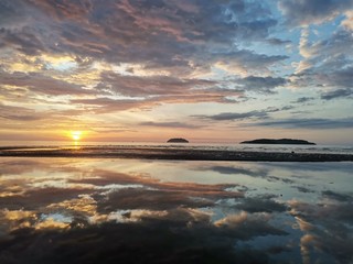 Beautiful Sunset view in Tanjung Aru Beach, Kota Kinabalu. Sabah, Malaysia. Borneo. The Land Below...