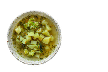 soup broccoli, broth and other vegetables (vegetarian first course) menu concept. background. top view. copy space