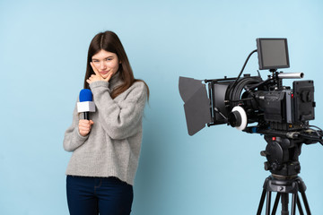 Young reporter woman holding a microphone and reporting news thinking an idea