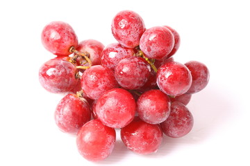 Fresh red grape on white background