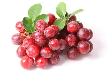 Fresh red grape on white background