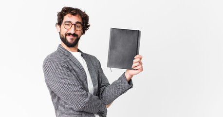 young crazy bearded man with a notebook