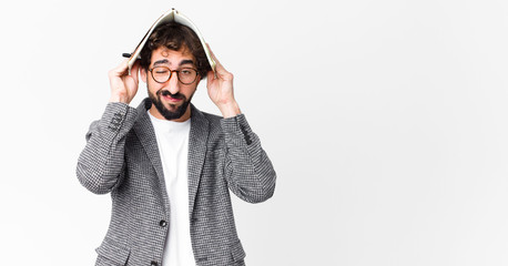 young crazy bearded man with a notebook
