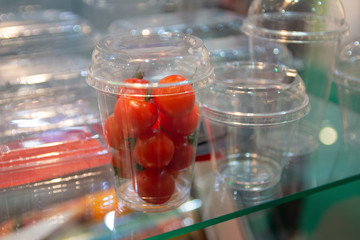 Fototapeta na wymiar ariety of food packaging in the display case. Industry