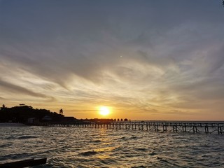 Beautiful sunset view in jetty Mabul Island, Semporna. Tawau, Sabah. Malaysia, Borneo. The Land...