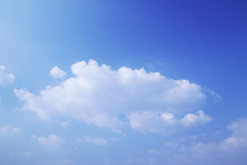 Blue sky and a beautiful white cloud in sunny weather