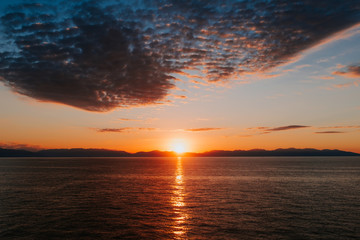 Naklejka premium Tramonto sulla costa della Sardegna