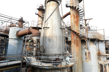 Unused and abandoned metal pipes in factories