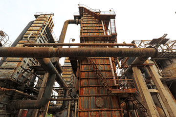 Unused and abandoned metal pipes in factories