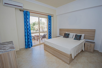 Interior design of double bedroom in apartment