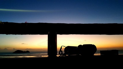 Naklejka na ściany i meble silhouette of car on sunset