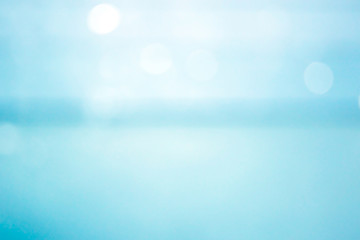 Blurred images that look like water and have indigo bokeh.