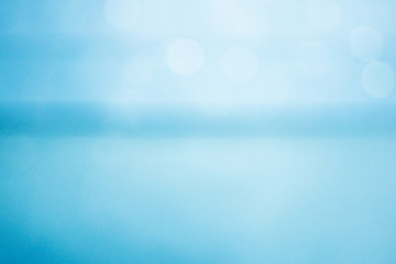 Blurred images that look like water and have indigo bokeh.