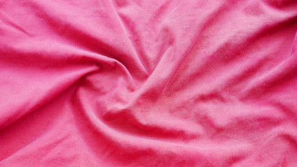 Fototapeta na wymiar colorful silk cotton background. red fabric texture