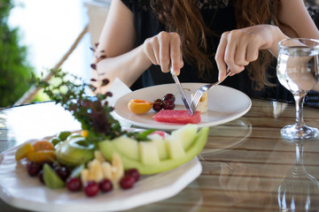 Obraz na płótnie Canvas mixed summer fruits on the table