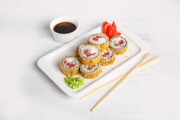 Deep fried Japanese spring roll . wand also features a Traditional Japanese menu on a white background
