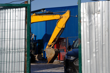 Excavator bucket. Work of special equipment at a construction site.