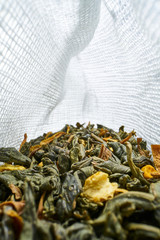 Inside a tea bag herbal tea on a light background