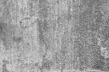 Obraz premium Texture of a concrete wall with cracks and scratches which can be used as a background