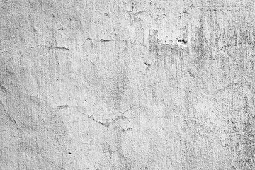 Texture of a concrete wall with cracks and scratches which can be used as a background
