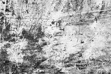 Texture of a concrete wall with cracks and scratches which can be used as a background