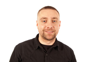 Young man dressed in  black sweater smiling portrait isolated on white