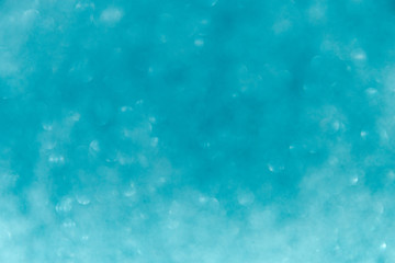 Defocus bright pastel blue shiny background. The view from the top. Minimalism. Selective focus